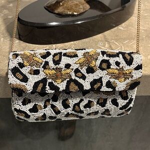Chic Beaded Clutch with Gold and Black Design